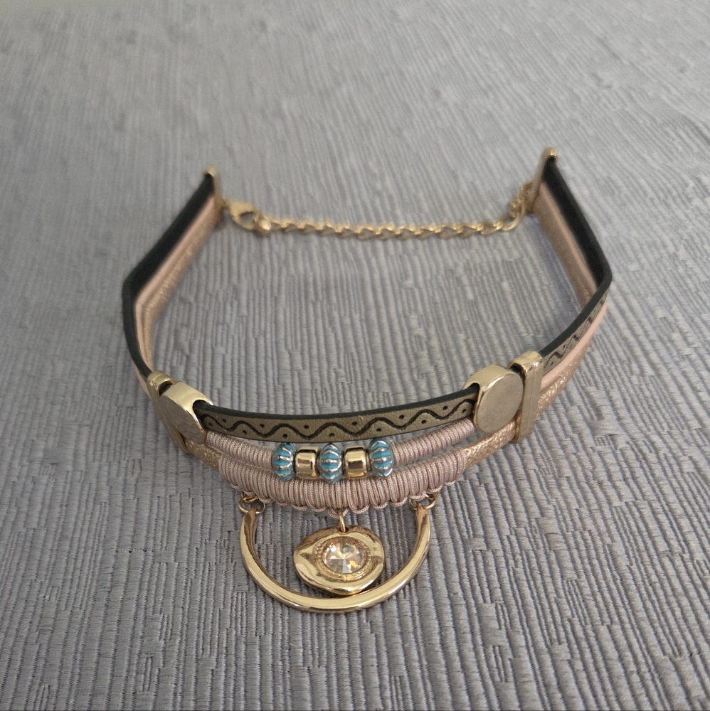 Southwest Chocker With Faux Gold Accents Metallic Strap and Faux Crystal